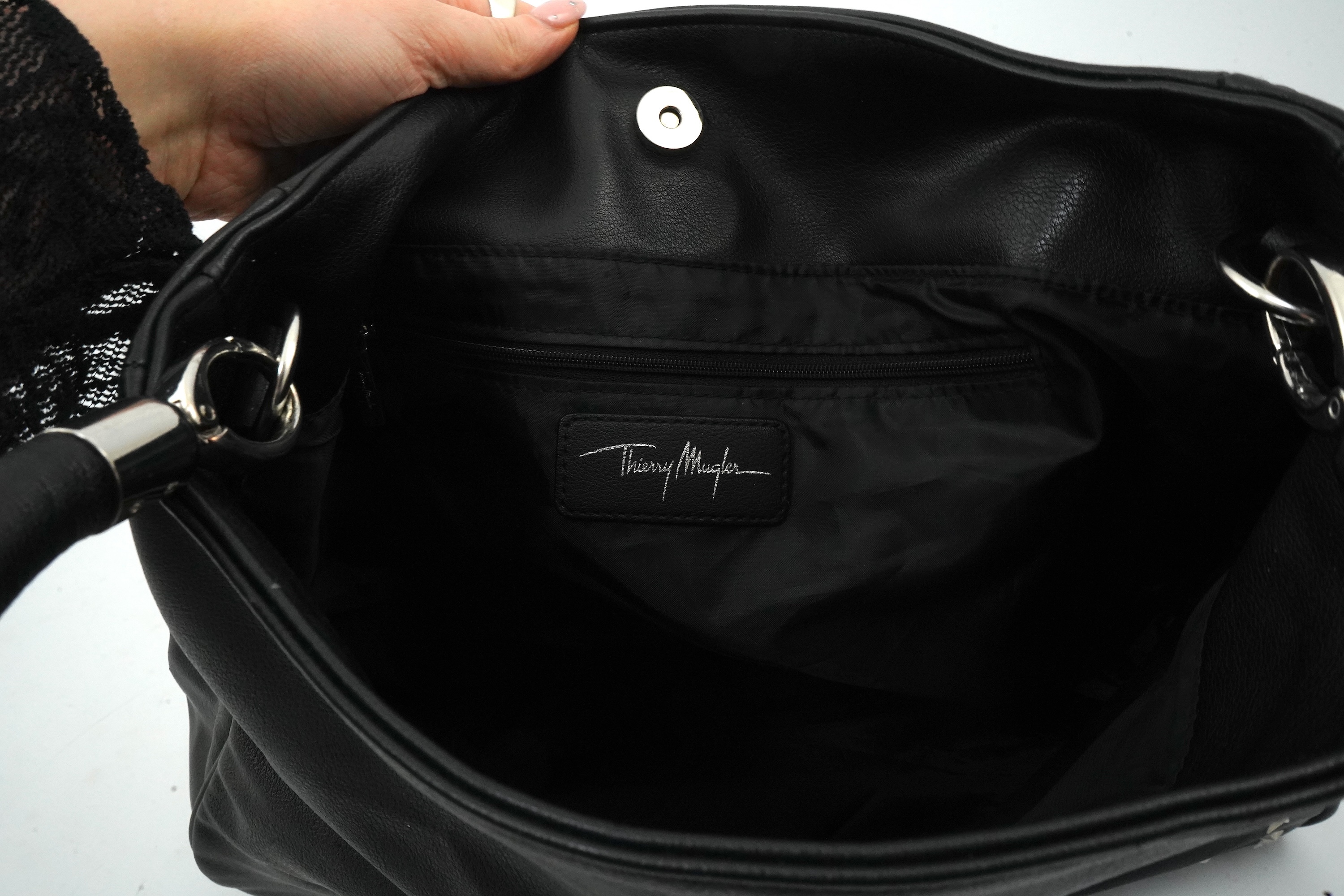 A black Thierry Mugler tote